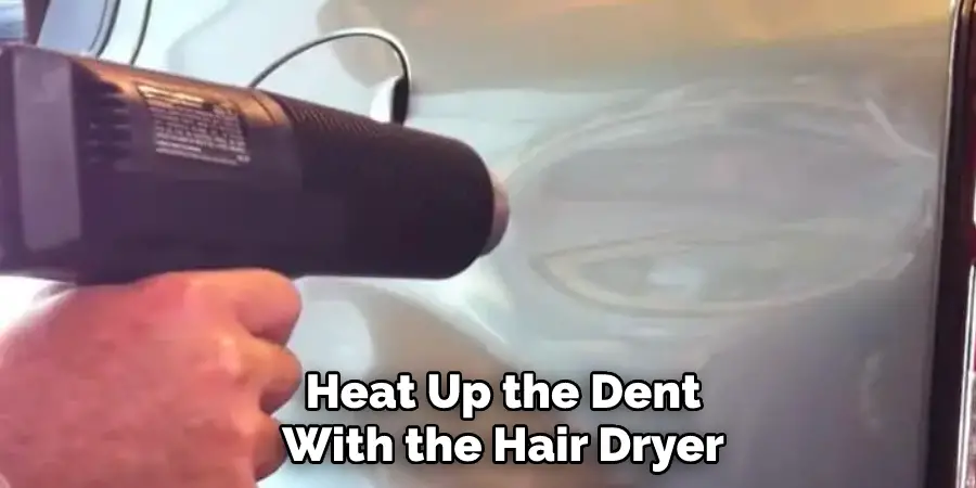 Heat Up the Dent With the Hair Dryer