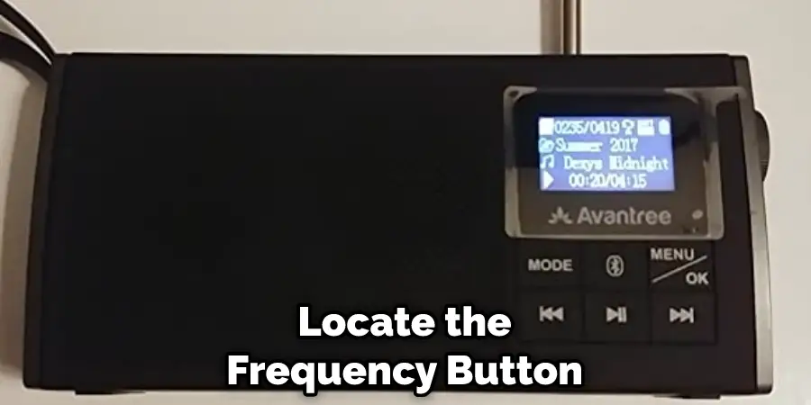 Locate the Frequency Button