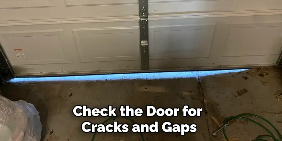 Check the Door for Cracks and Gaps