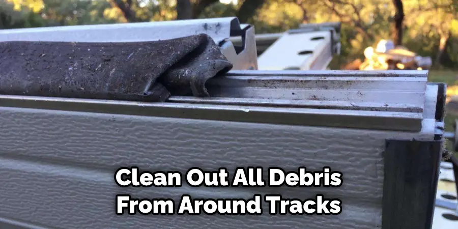 Clean Out All Debris From Around Tracks