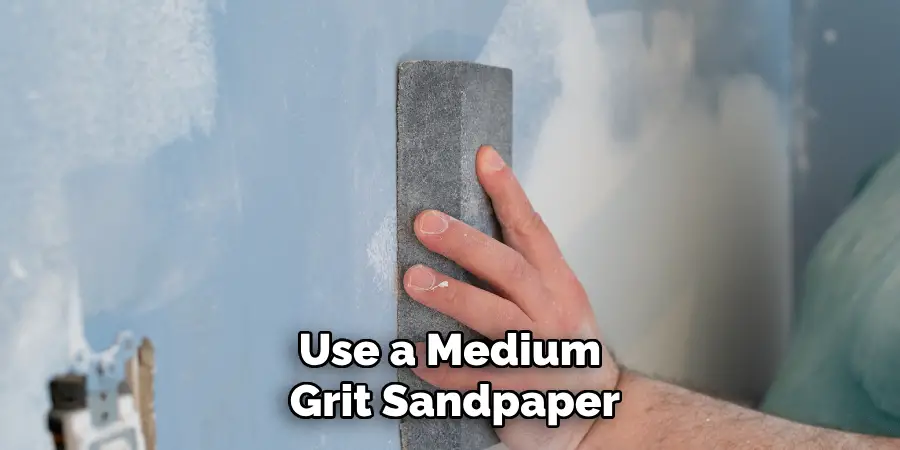 Use a Medium Grit Sandpaper