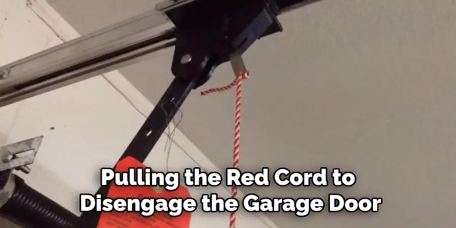 Pulling the Red Cord to Disengage the Garage Door