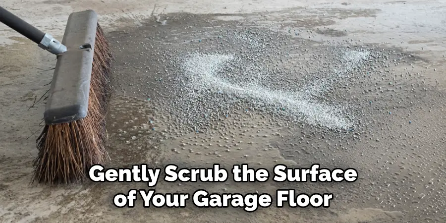 Gently Scrub the Surface of Your Garage Floor