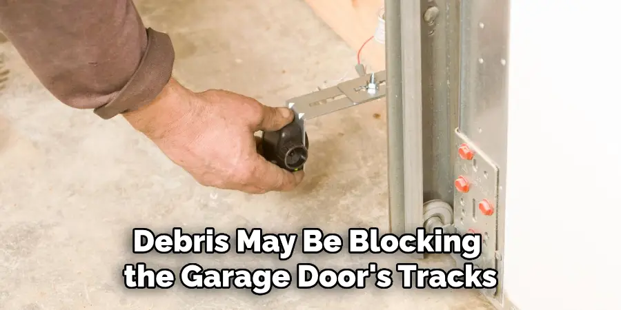 Debris May Be Blocking the Garage Door's Tracks