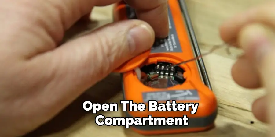 Open the Battery Compartment