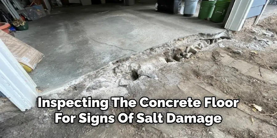 Inspecting The Concrete Floor
For Signs Of Salt Damage