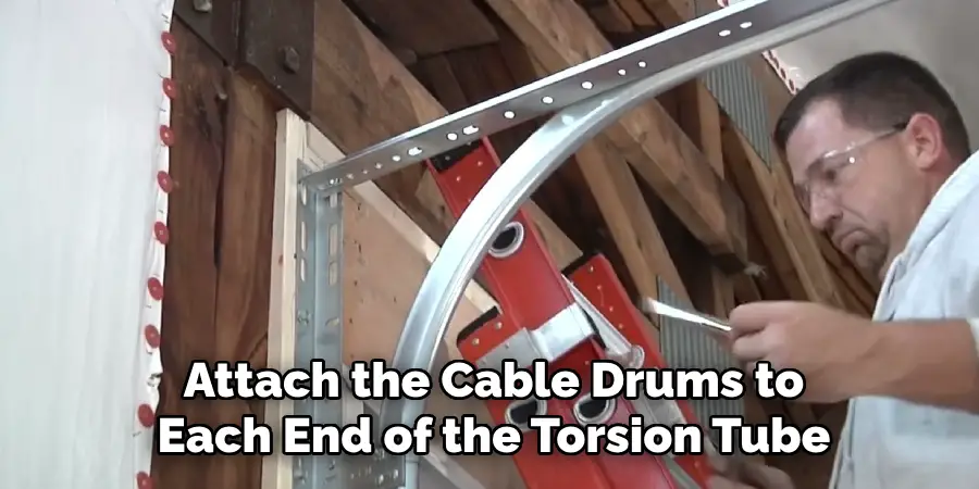 Attach the Cable Drums to
Each End of the Torsion Tube