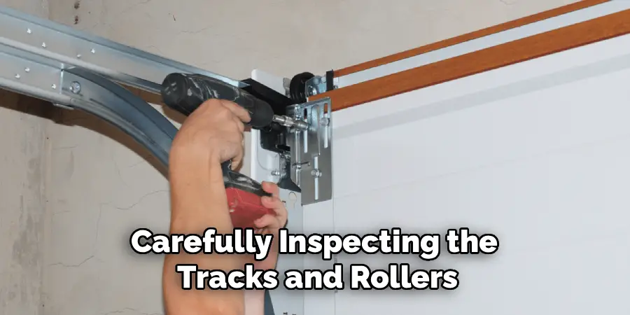 Carefully Inspecting the
Tracks and Rollers