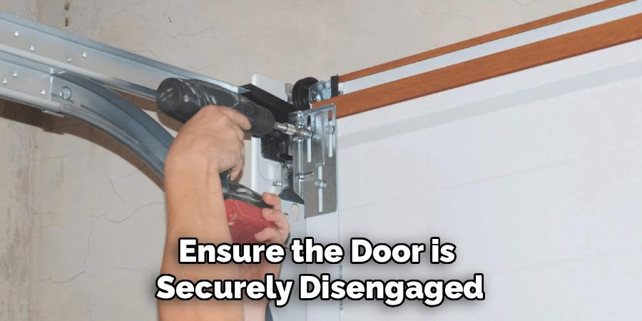 Ensure the Door is
Securely Disengaged