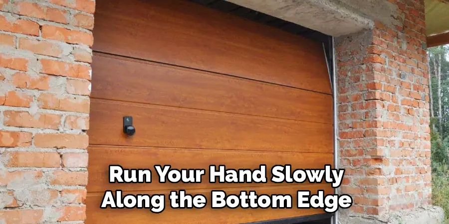Run Your Hand Slowly
Along the Bottom Edge