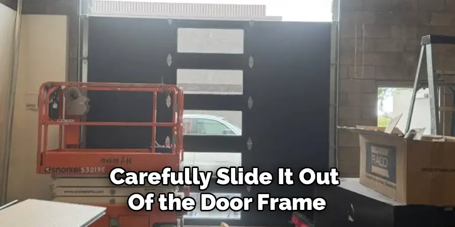 Carefully Slide It Out 
Of the Door Frame