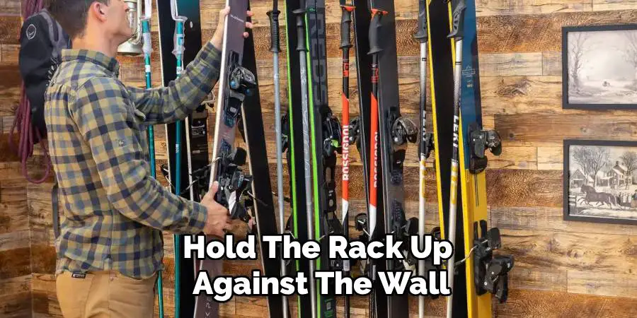 Hold The Rack Up 
Against The Wall