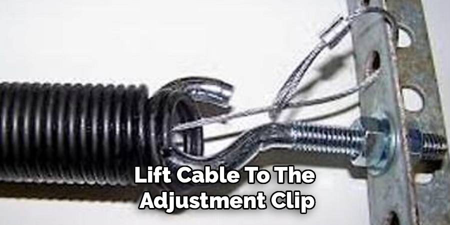 Lift Cable To The 
Adjustment Clip