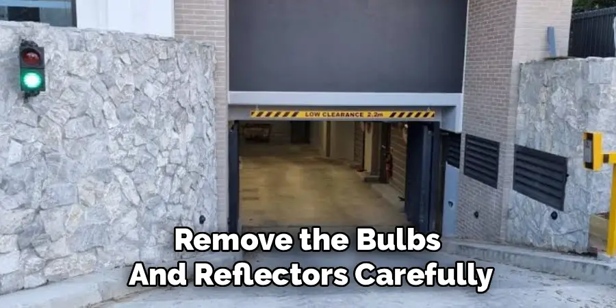 Remove the Bulbs 
And Reflectors Carefully