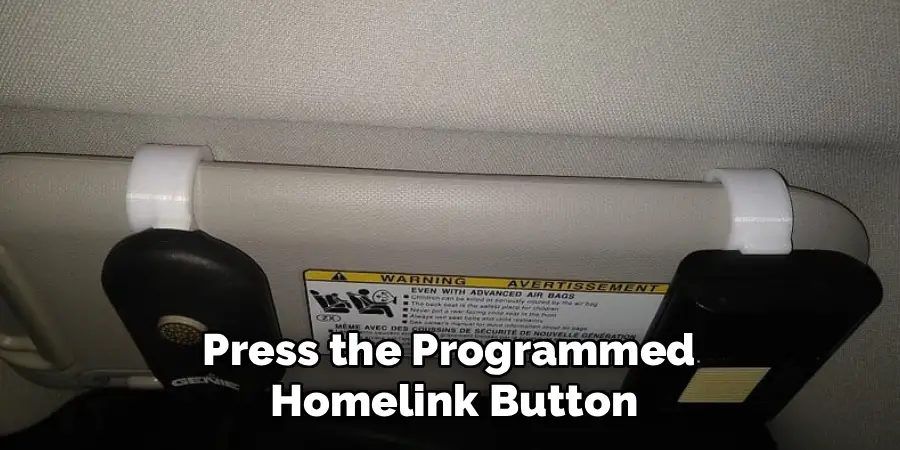 Press the Programmed
Homelink Button