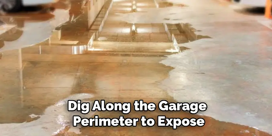 Dig Along the Garage
 Perimeter to Expose